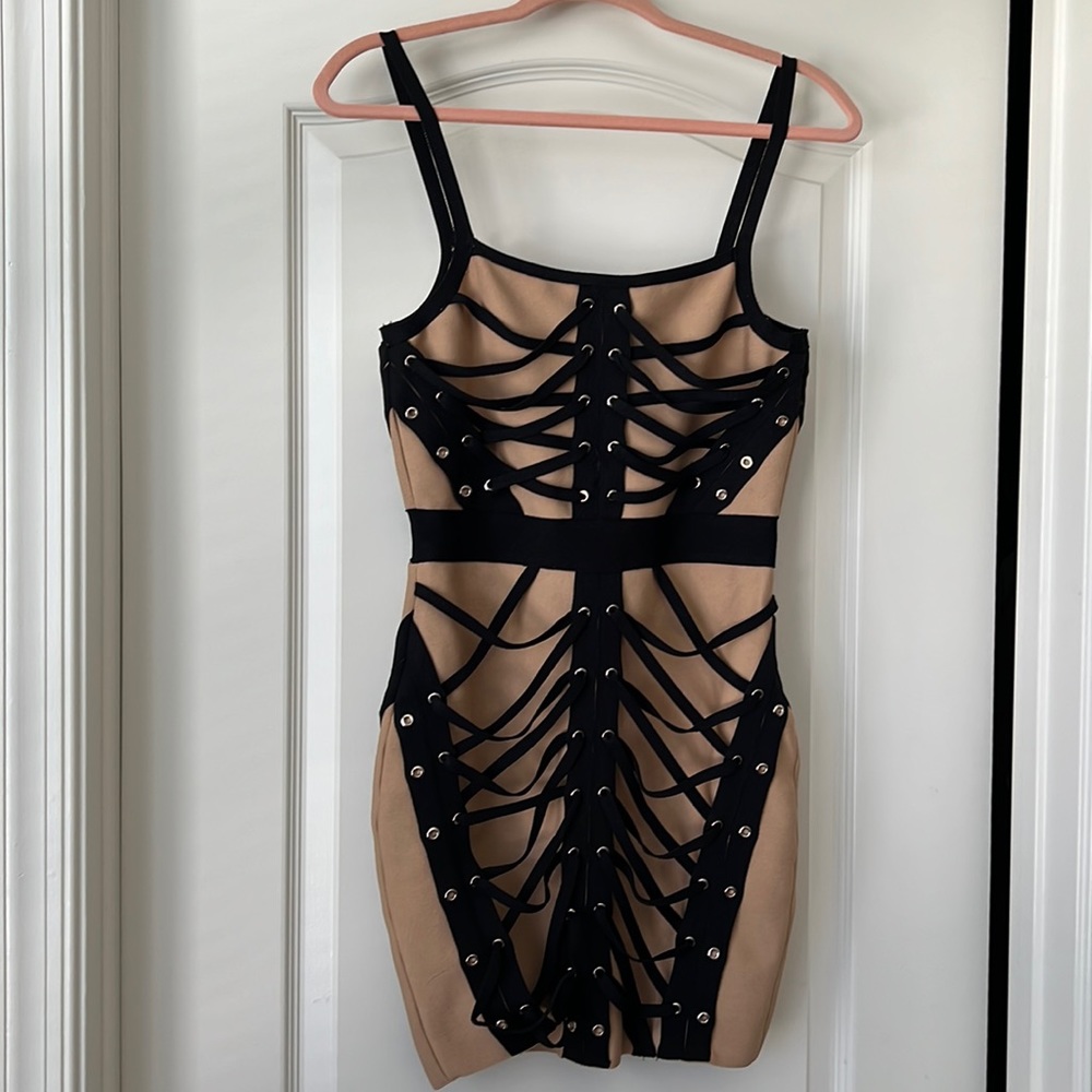 This bandage dress has a lot of stretch. Size UK8 - US4- EVA 36. Worn 1 time.